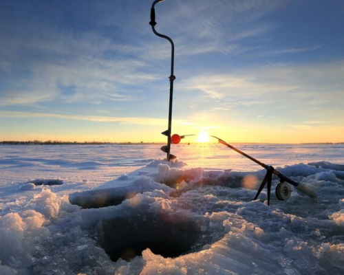 PESCA SUL GHIACCIO IN MOTOSLITTA